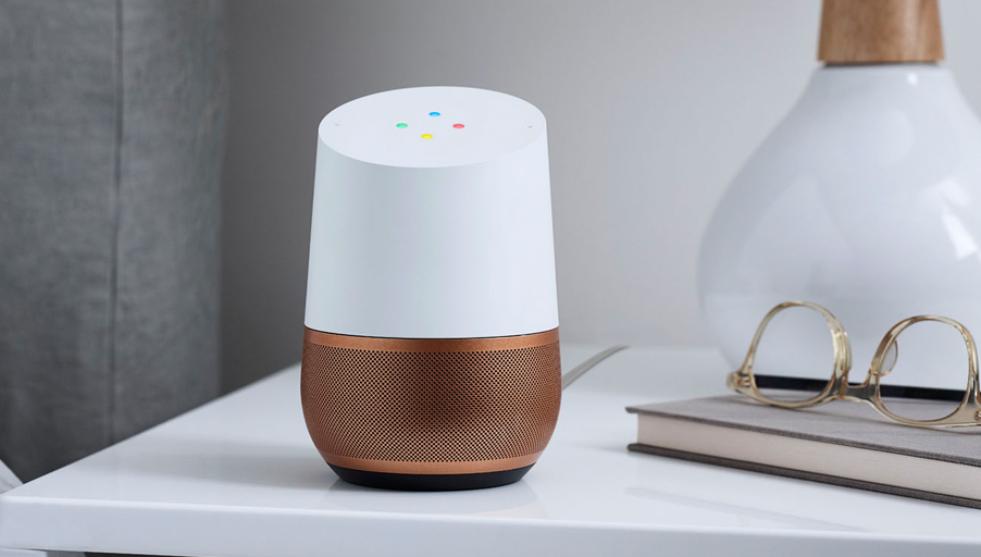 Google Home smart device in white with a copper base