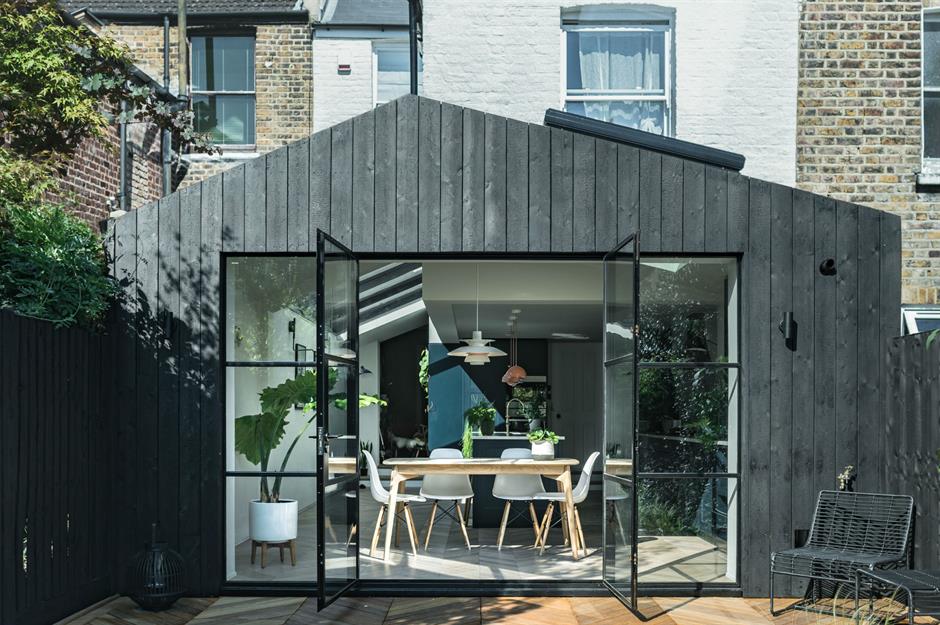 This side and rear extension with black charred cladding was completed by SAM Architects and Lunar Architects. Image: Da Feng 