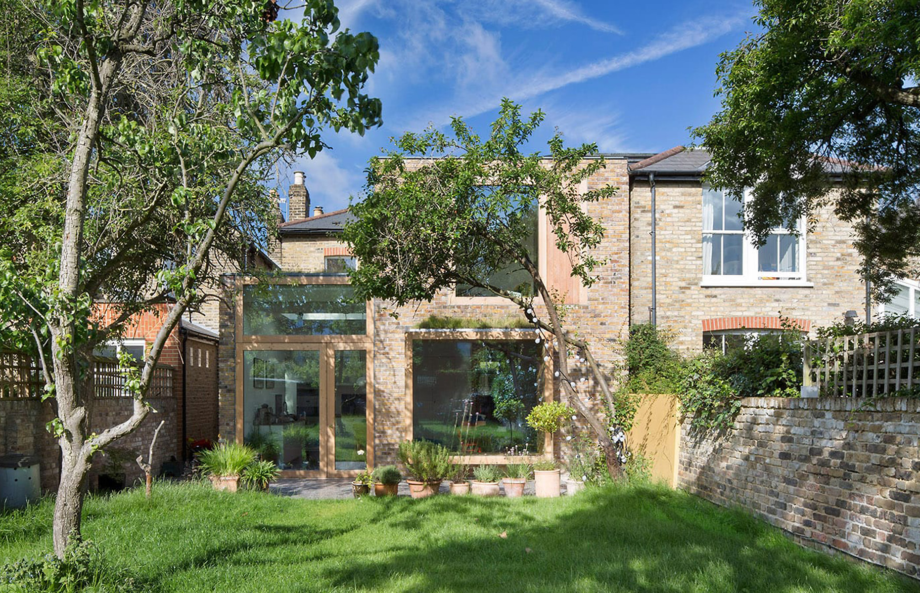 Nestled in a Conservation Area, this Hammersmith home has had a two-storey, full-width extension added to the rear. Image: Studio 30 Architects