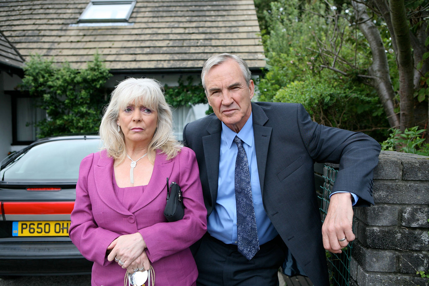 Pam and Mick Shipman in front of the Billericay bungalow. Image: BBC