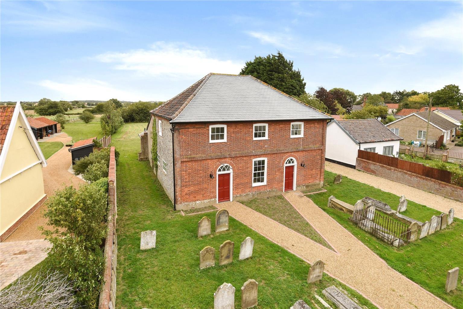 This converted chapel for sale comes with graves in the front garden. Image: Bedford Estate Agents