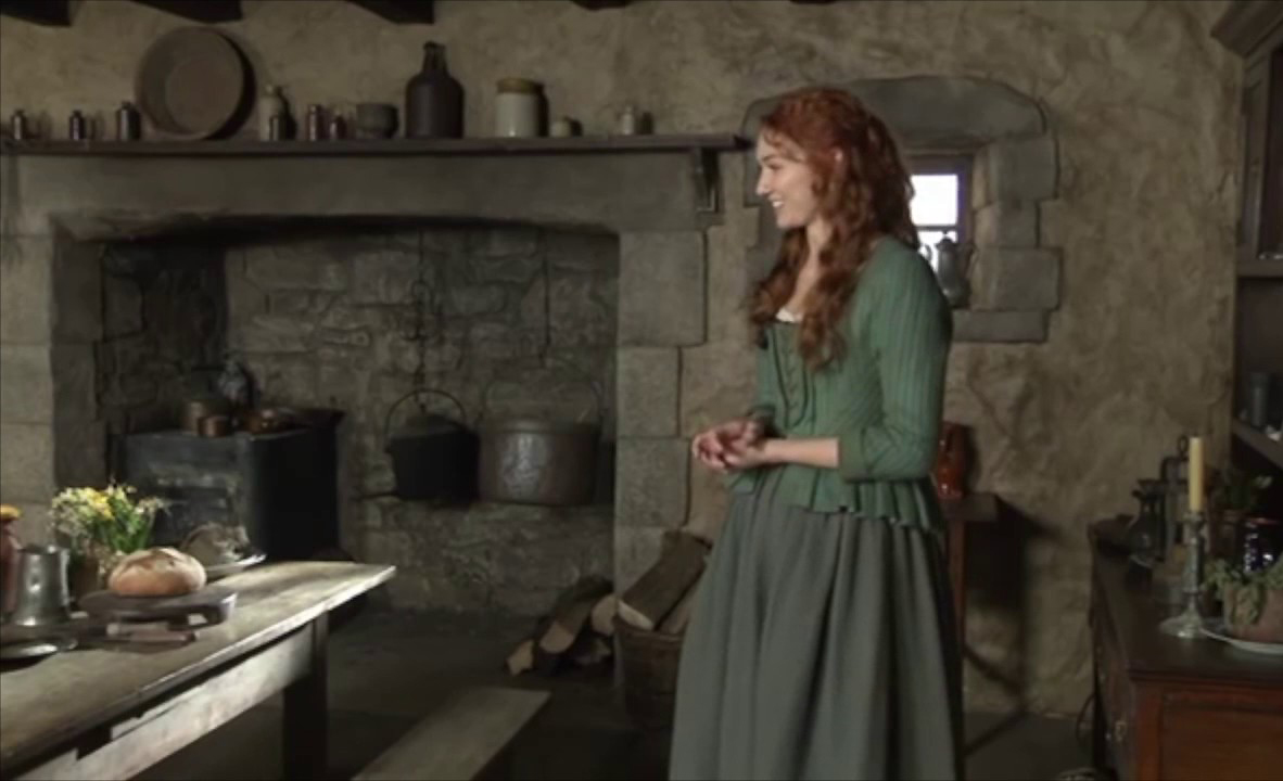 Actress Eleanor Tomlinson on the set of Poldark, with the infamous wooden table. Image: BBC