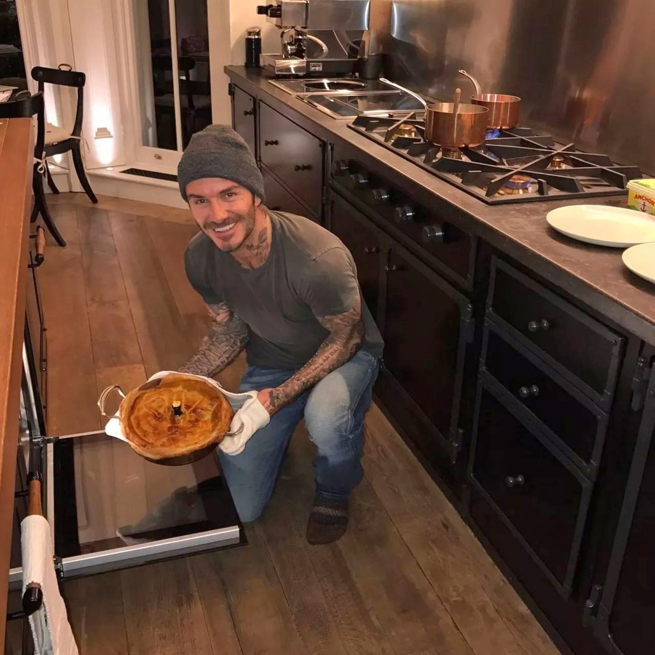 David Beckham shows off his baking skills in their cool kitchen. Image: @victoriabeckham / Instagram