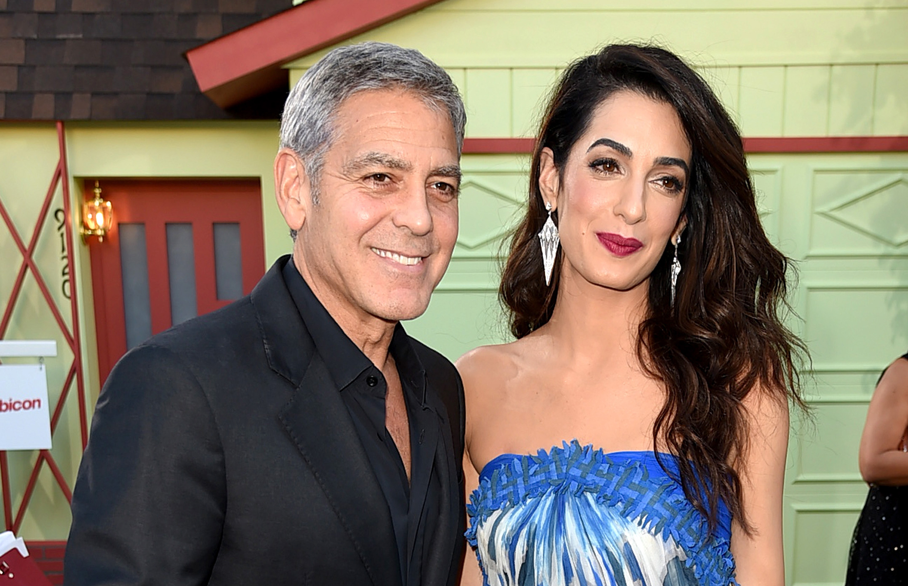 George and Amal Clooney will serve lunch to you and a guest if you win the fundraising raffle. Image: Kevin Winter/Getty Images