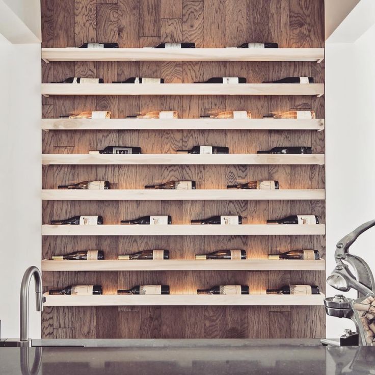 Kitchen wall-mounted wine rack. Image: Instagram / @timbrownarch