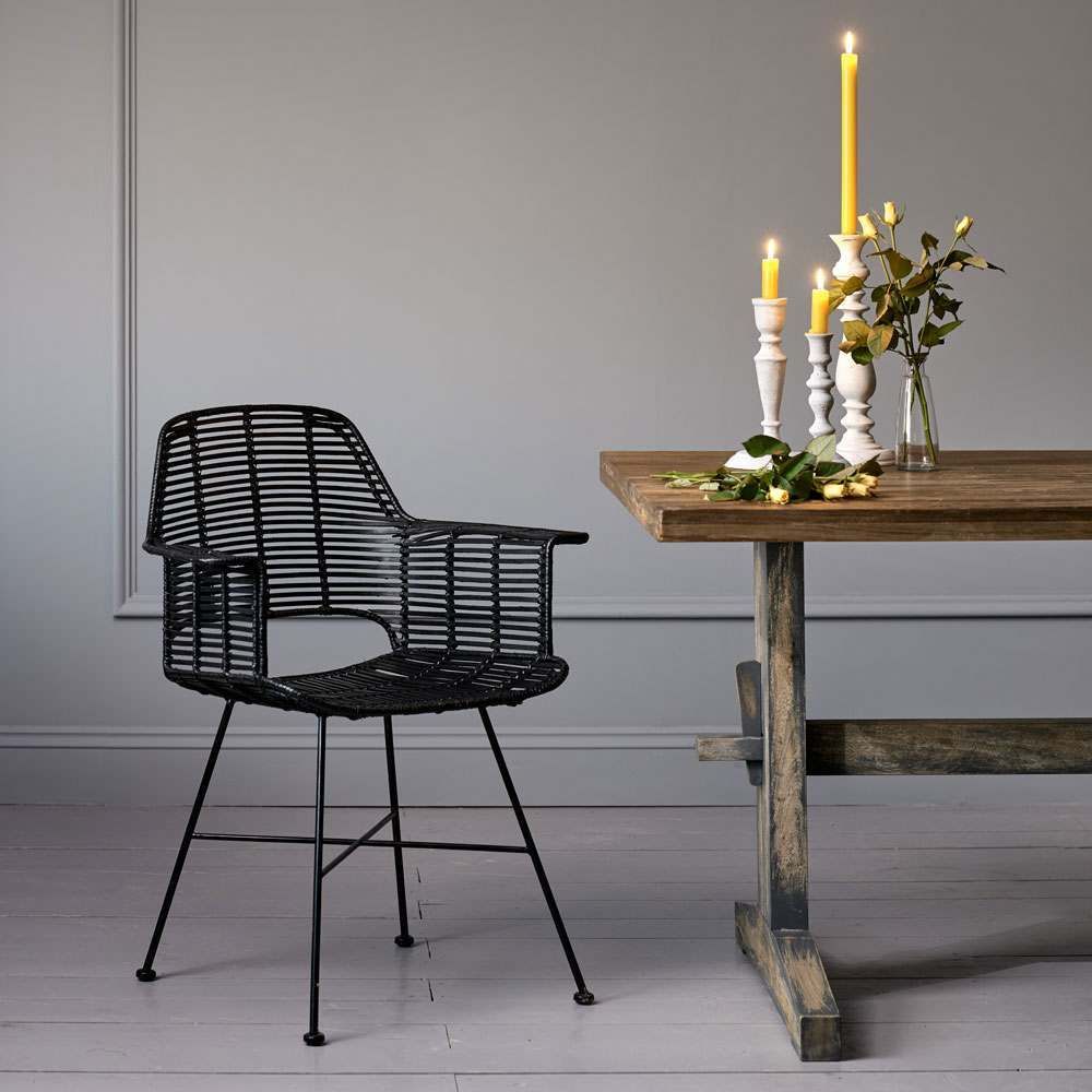 Experiment with glossy black rattan for a modern, minimalist scheme. Image: Graham and Green