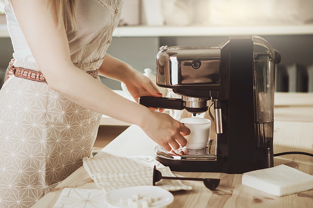 Regularly clean your coffee machine to keep bacteria at bay. Image: Nataliia Zhekova/Shutterstock