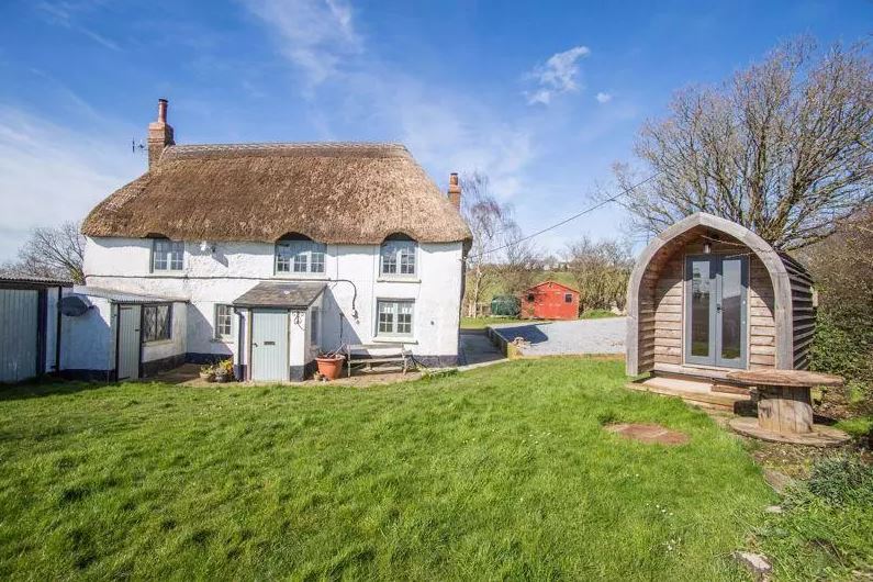 The quaint country home comes with a generous garden. Image: OnTheMarket