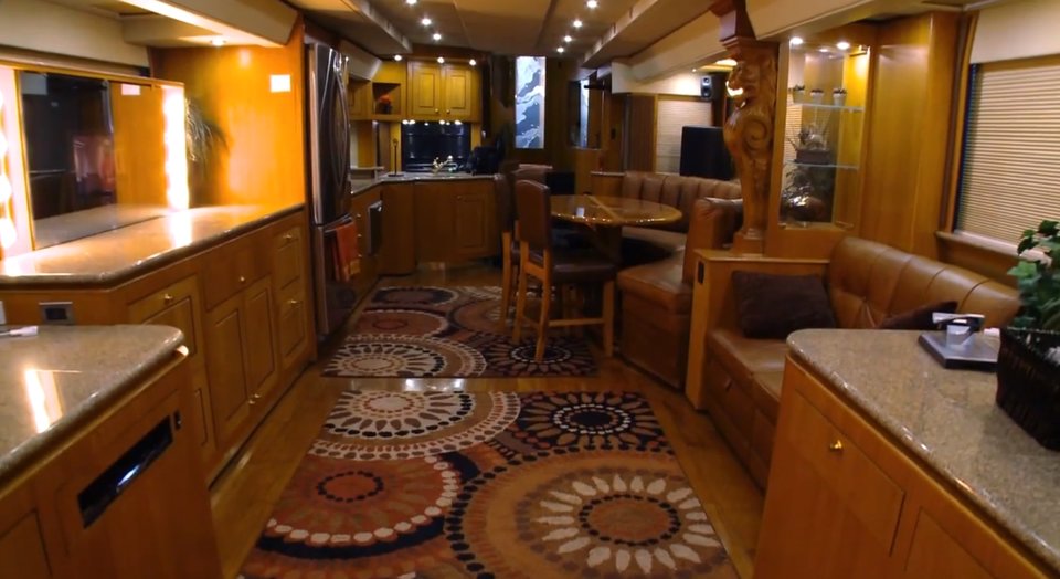 Inside Will's luxury motorhome, complete with bespoke wood cabinetry and $30,000 worth of leather. Image: HGTV