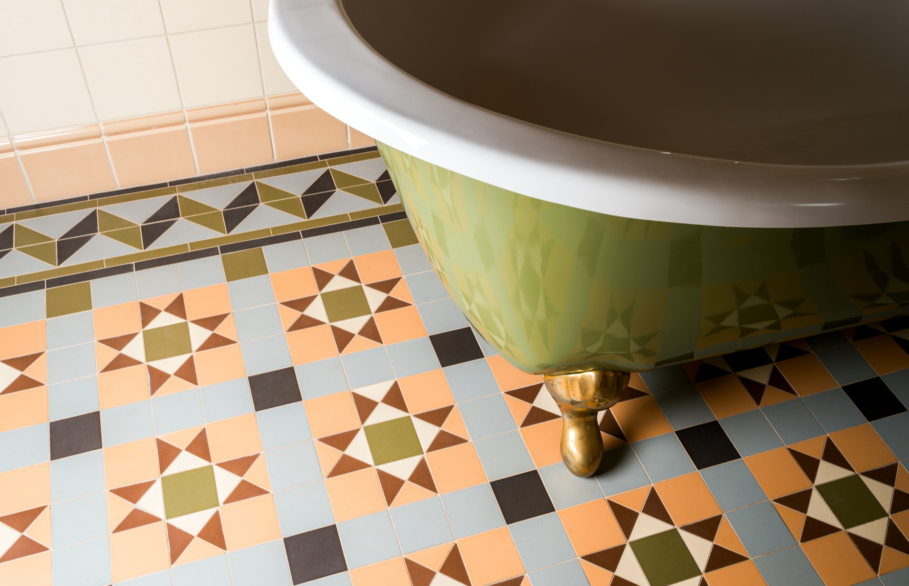 This bathroom wows with a patterned tiled floor, complete with an intricate border. Image: P A / Shutterstock