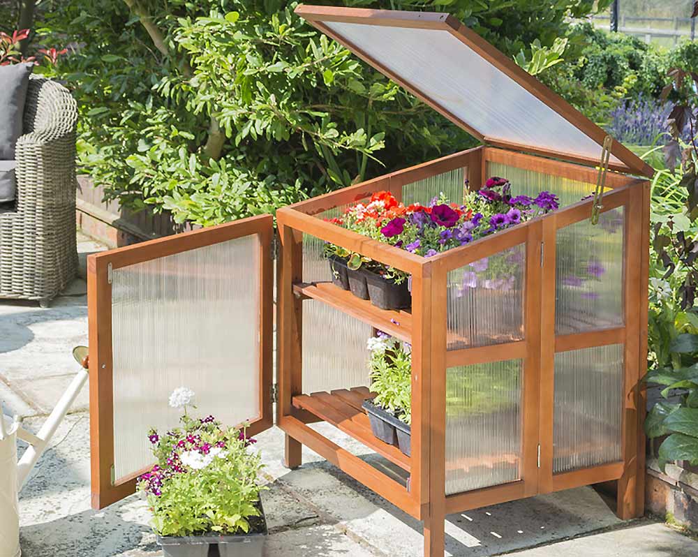 This handy elevated cold frame is ideal for smaller spaces. Image: Crocus