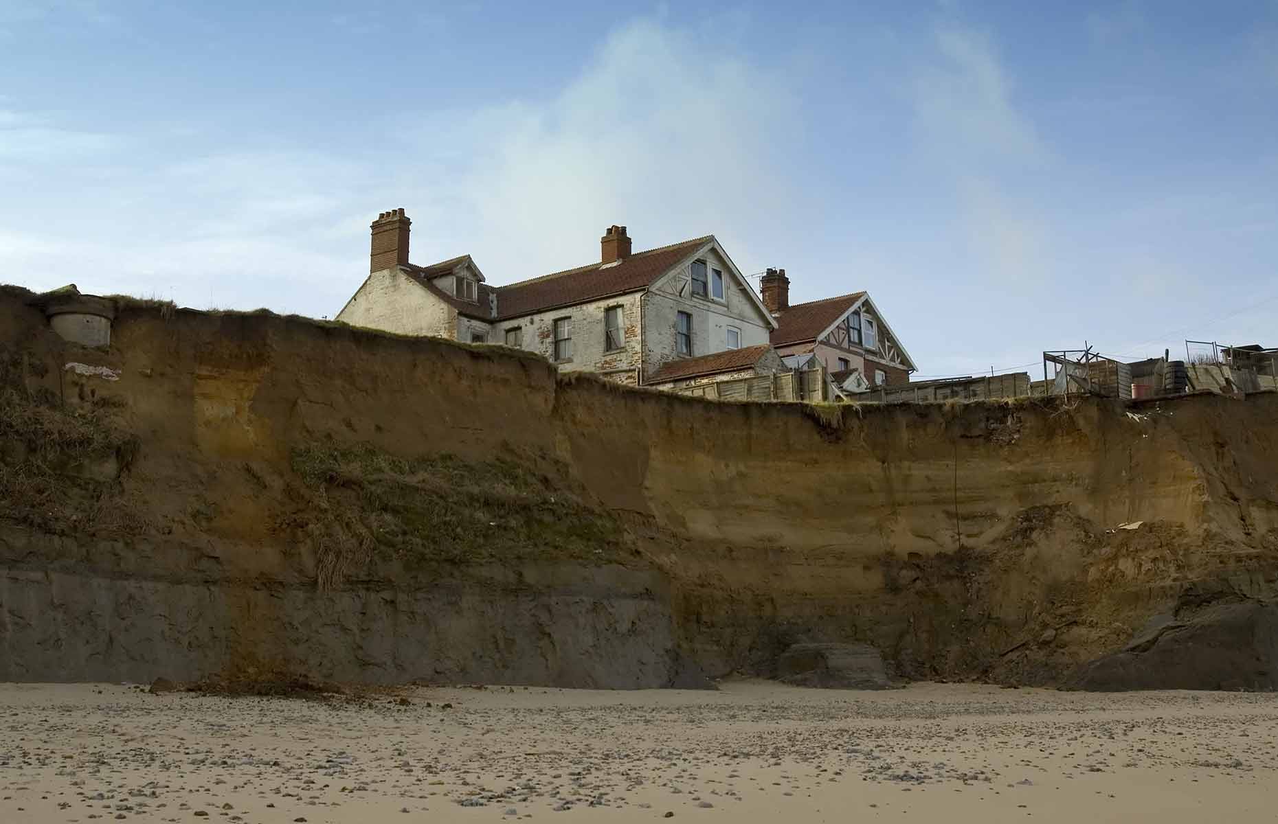 The town of Happisburgh in Norfolk suffers from severe coastal erosion linked to rising sea levels. Image: Chris I White / Shutterstock
